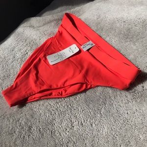 Dippin’ Daisy Ultra bottoms in Orange.